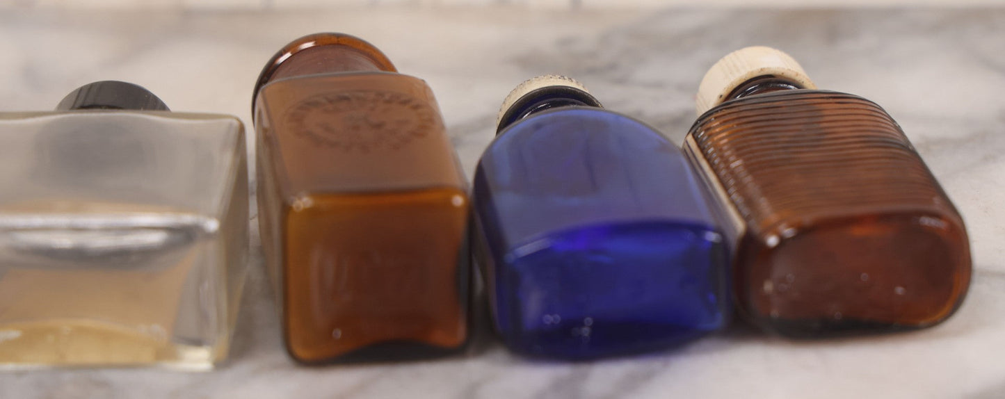 Lot 073 - Grouping Of Five Antique Bottles With Paper Labels Including Witch Hazel, John Laws, Columbus M.S., Spirit Of Peppermint, Koch's Pharm., Greenwich, R.I., Potassium Metabisulphate, Kodak, Mercury, Guterman Dental, N.Y., & Nux Vomica