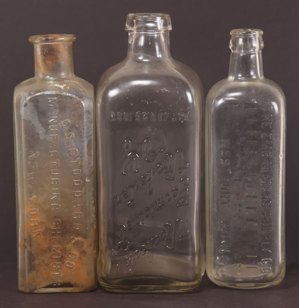 Lot 076 - Grouping Of Three Antique Clear Glass Bottles Including Embalming Supply Co., Westport, Connecticut, Rochester Germicide Co., Rochester, New York, And G.S. Stoddard & Co., New York