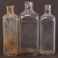 Lot 076 - Grouping Of Three Antique Clear Glass Bottles Including Embalming Supply Co., Westport, Connecticut, Rochester Germicide Co., Rochester, New York, And G.S. Stoddard & Co., New York