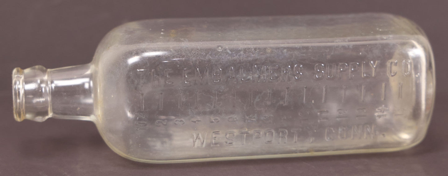 Lot 076 - Grouping Of Three Antique Clear Glass Bottles Including Embalming Supply Co., Westport, Connecticut, Rochester Germicide Co., Rochester, New York, And G.S. Stoddard & Co., New York