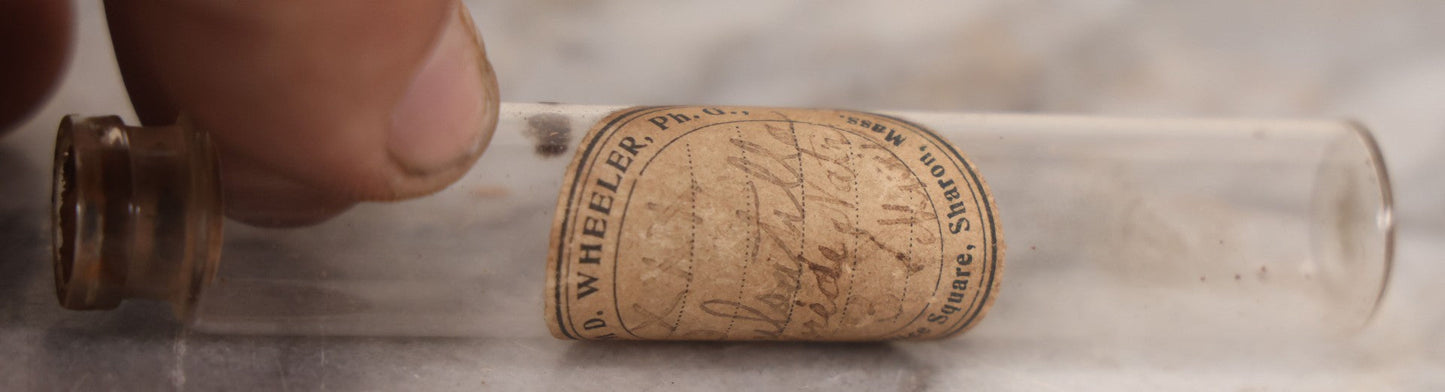 Lot 078 - Grouping Of Eight Antique Apothecary Items Including Amber Bottle With "G.C. Oval" Label, Balsam Bottle, Hall & Lyon Co. Pill Box, Carter's Laxative Vial, Wheeler Pharmacist Vial, Sharon, M.A., Glycerine Jelly Bottle, & John Bull Eye Wash Cup