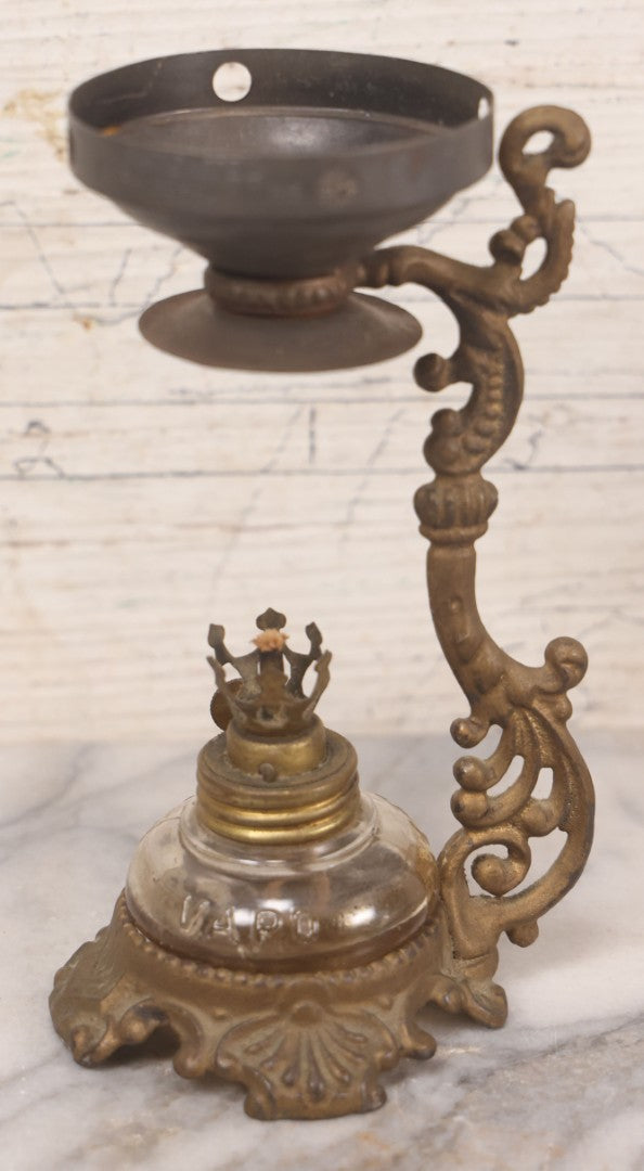 Lot 082 - Antique Vapo-Cresolene Lot Including Two Brass Vaporizers With Lamps (One Complete, One Incomplete) And Poison Bottle With Studded Poison Ribs And Paper Label, Vapo-Cresolene Co., New York, NY