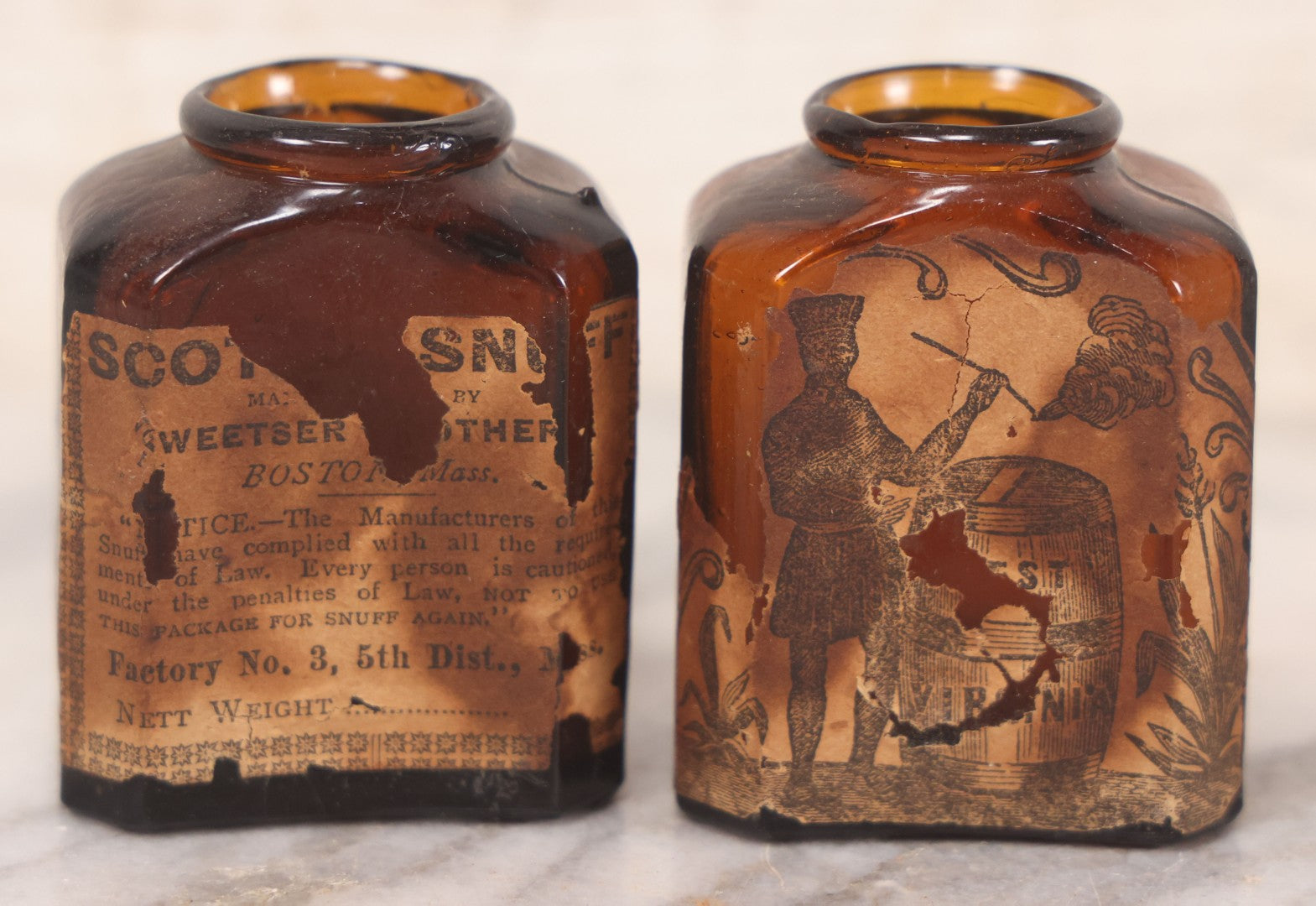 Lot 085 - Pair Of Antique Amber Glass Snuff Bottles With Partial Paper Labels Including West Virginia Snuff And Scott's Snuff