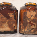 Lot 085 - Pair Of Antique Amber Glass Snuff Bottles With Partial Paper Labels Including West Virginia Snuff And Scott's Snuff