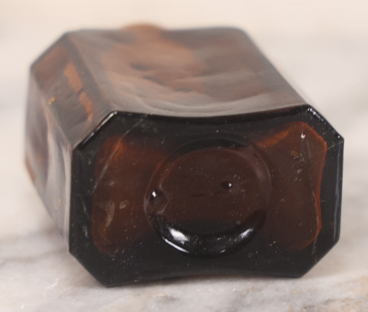 Lot 085 - Pair Of Antique Amber Glass Snuff Bottles With Partial Paper Labels Including West Virginia Snuff And Scott's Snuff