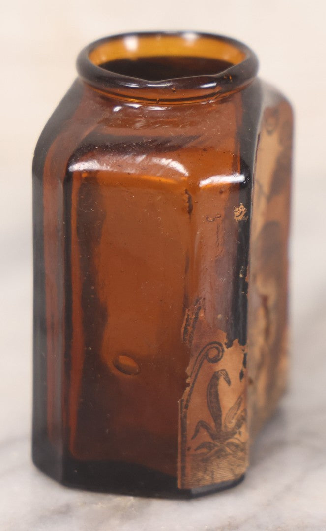 Lot 085 - Pair Of Antique Amber Glass Snuff Bottles With Partial Paper Labels Including West Virginia Snuff And Scott's Snuff