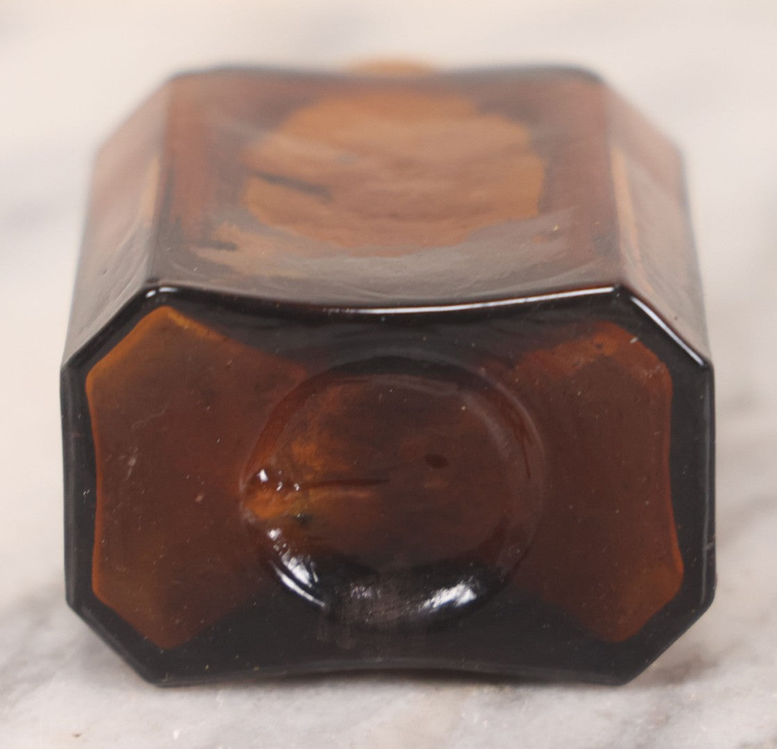 Lot 085 - Pair Of Antique Amber Glass Snuff Bottles With Partial Paper Labels Including West Virginia Snuff And Scott's Snuff