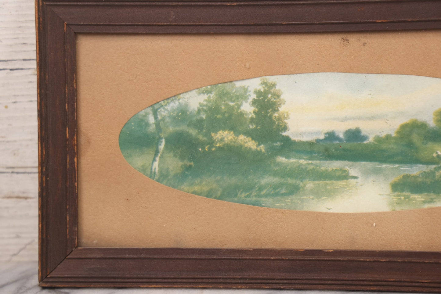 Lot 091 - Antique Landscape Print Of Sheep In A Field By A River With Oval Cut Mat, In Long Narrow Frame, 6-1/2" x 13-1/2"