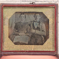 Lot 093 - Antique 1/6th Plate Daguerreotype Photograph Of Couple In Full Leatherette Case, Gold Painted Border, Faded Red Cushion, Anthony, Clark & Co. Label On Verso, Note Damage To Case