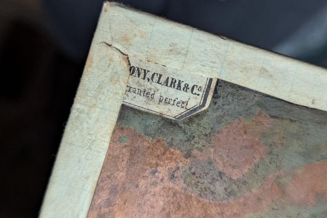 Lot 093 - Antique 1/6th Plate Daguerreotype Photograph Of Couple In Full Leatherette Case, Gold Painted Border, Faded Red Cushion, Anthony, Clark & Co. Label On Verso, Note Damage To Case