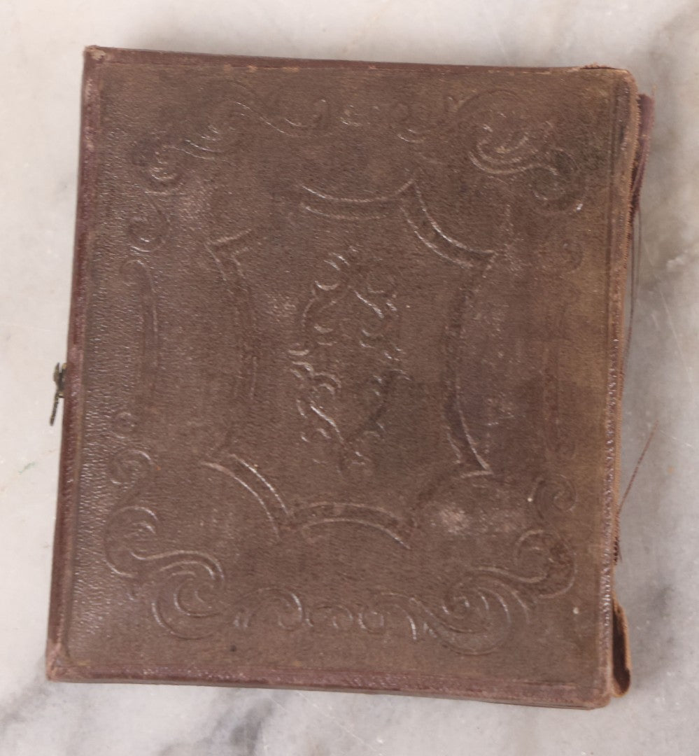 Lot 093 - Antique 1/6th Plate Daguerreotype Photograph Of Couple In Full Leatherette Case, Gold Painted Border, Faded Red Cushion, Anthony, Clark & Co. Label On Verso, Note Damage To Case