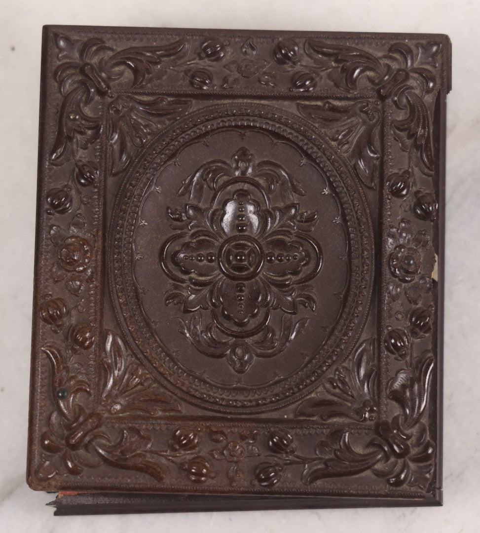 Lot 094 - Antique 1/6th Plate Daguerreotype Photograph Of Man In Full Thermoplastic Case With Abstract Floral Design, Brass Mat, Dark Red Cushion, Heavily Speckled Surface Of Photograph, Note Damage To Case