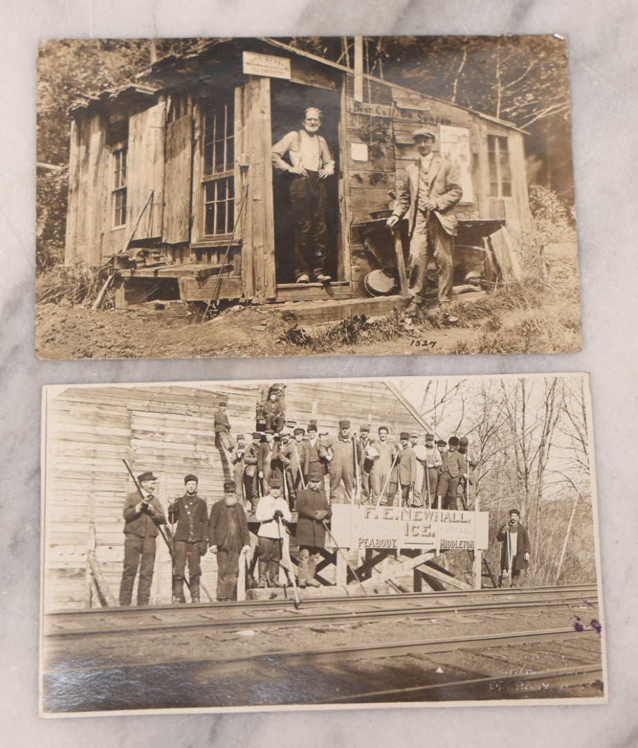 Lot 100 - Pair Of Antique Real Photo Postcards R.P.P.C., Including Photo Of Group Of Workers Posing With R.E. Newhall, Wholesale And Retail Ice Sign On Railroad Tracks, And Photo Of Two Men Posing At A Post Office Shack With Sign "Don't Call On Sunday"