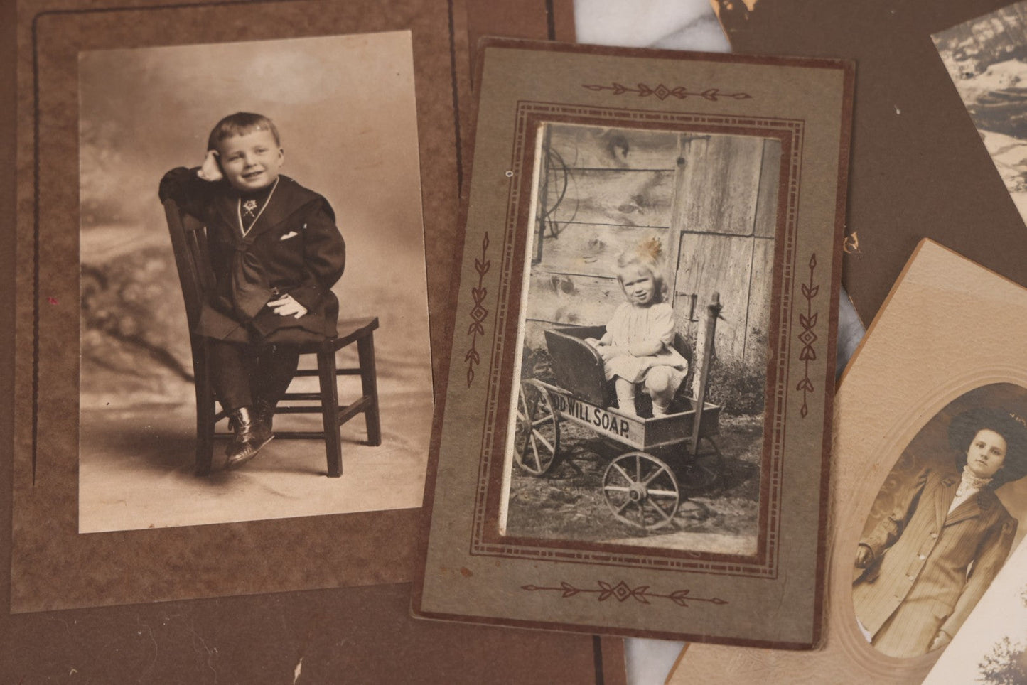 Lot 102 - Grouping Of 10+ Antique Photos With Various Subjects, Ephemera And More, Including Set Of Snapshot Album Pages Loosely Bound Without Covers, Tintype, Calling Card, And Boarded Photos