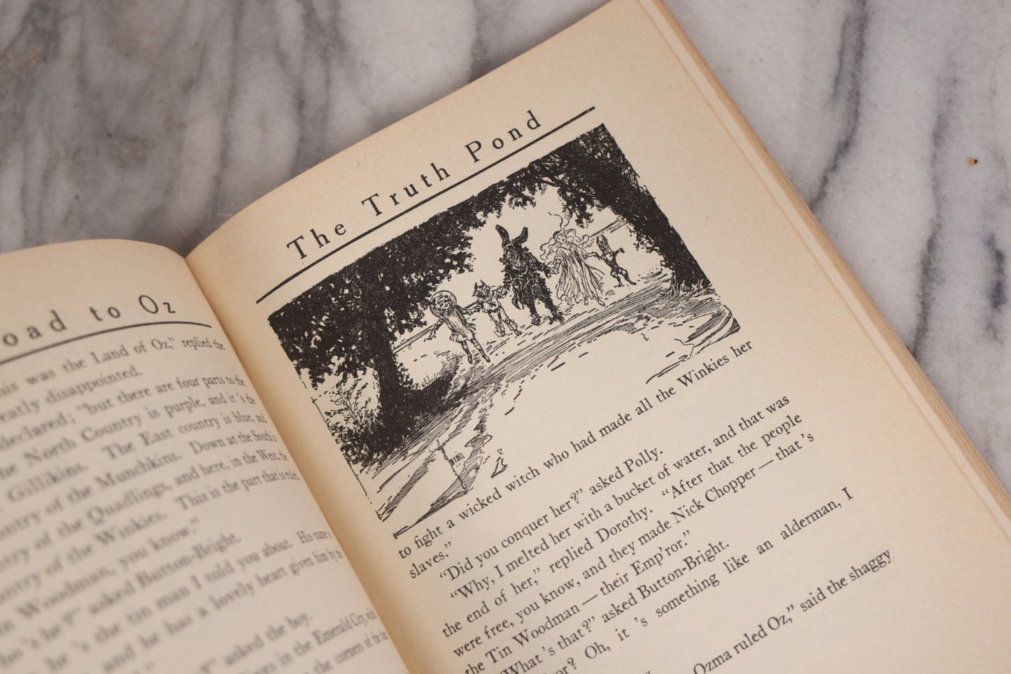 Lot 112 - "The Road To Oz" Antique Book By Frank L. Baum, Illustrated By John R. Neill, Ex-Library Copy, Published By The Reilly & Lee Co., Chicago, Copyright 1909