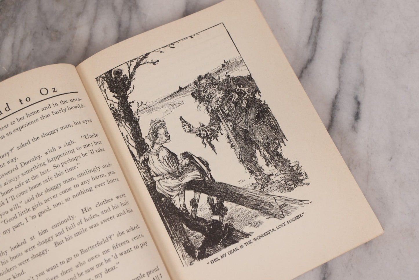 Lot 112 - "The Road To Oz" Antique Book By Frank L. Baum, Illustrated By John R. Neill, Ex-Library Copy, Published By The Reilly & Lee Co., Chicago, Copyright 1909