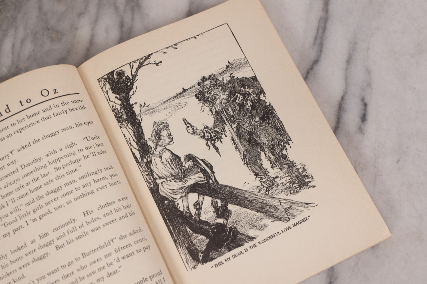 Lot 112 - "The Road To Oz" Antique Book By Frank L. Baum, Illustrated By John R. Neill, Ex-Library Copy, Published By The Reilly & Lee Co., Chicago, Copyright 1909