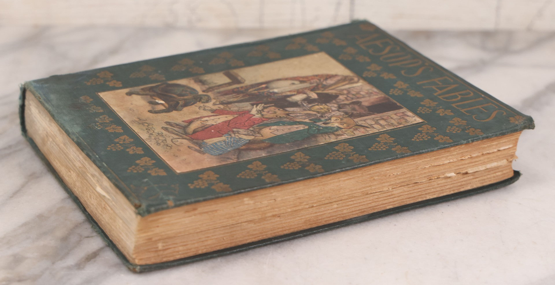 Lot 117 - "Aesop's Fables" Antique Book With Introduction By Elizabeth Luther Cary, Illustrated By J.M. Condé, Lithographed Cover, Published By The Platt & Peck Co., New York, Copyright 1913, Note Water Damage.