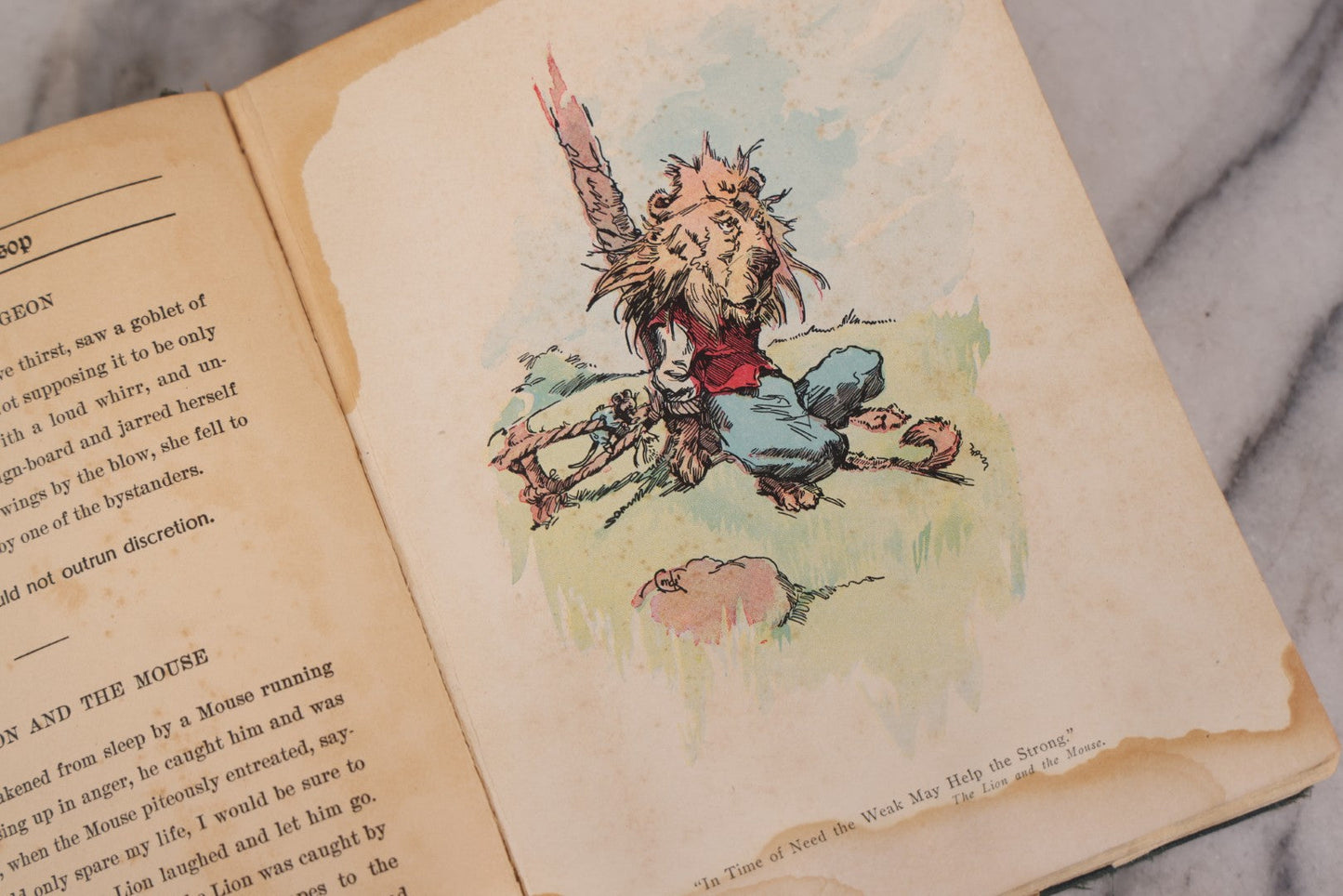 Lot 117 - "Aesop's Fables" Antique Book With Introduction By Elizabeth Luther Cary, Illustrated By J.M. Condé, Lithographed Cover, Published By The Platt & Peck Co., New York, Copyright 1913, Note Water Damage.