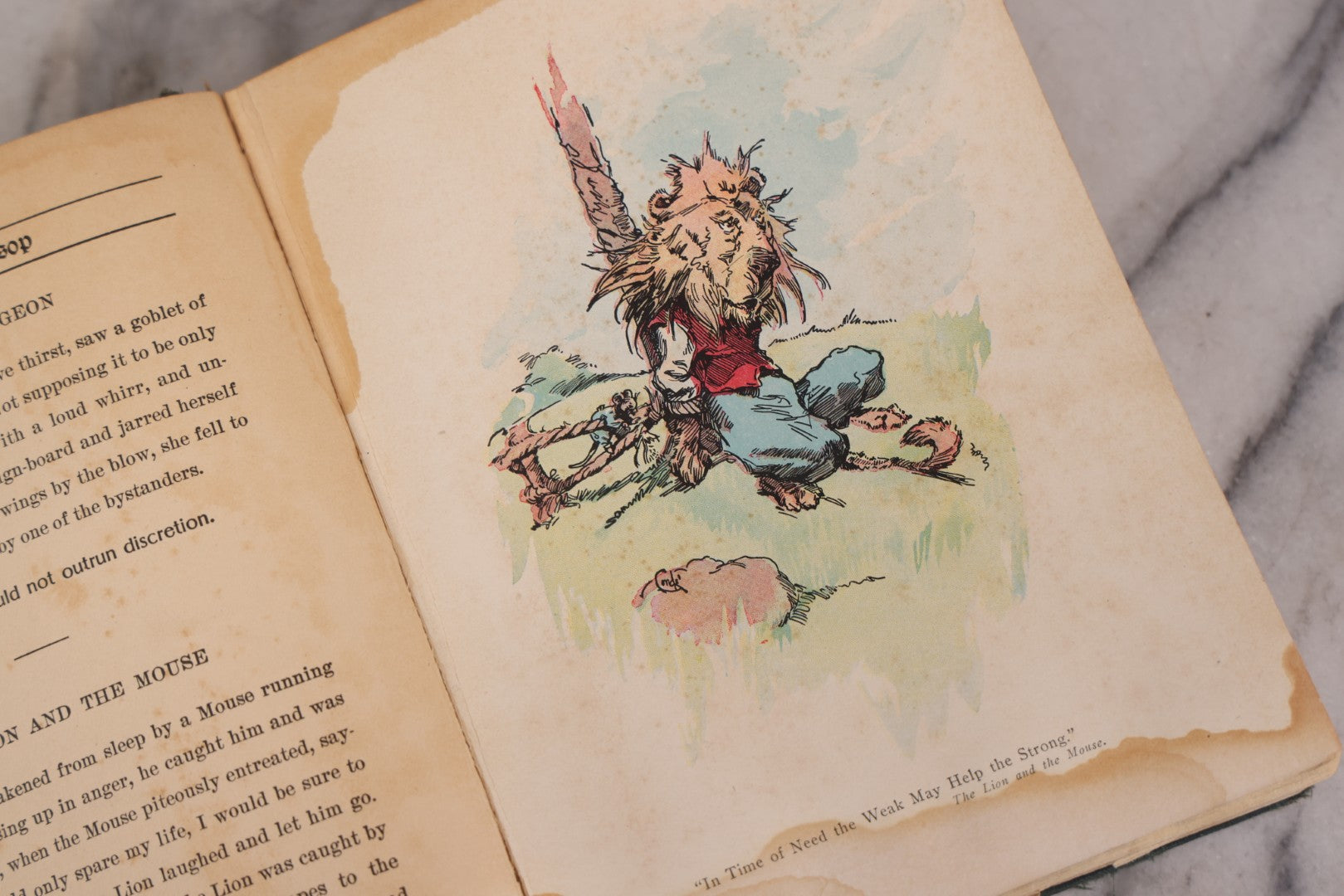 Lot 117 - "Aesop's Fables" Antique Book With Introduction By Elizabeth Luther Cary, Illustrated By J.M. Condé, Lithographed Cover, Published By The Platt & Peck Co., New York, Copyright 1913, Note Water Damage.