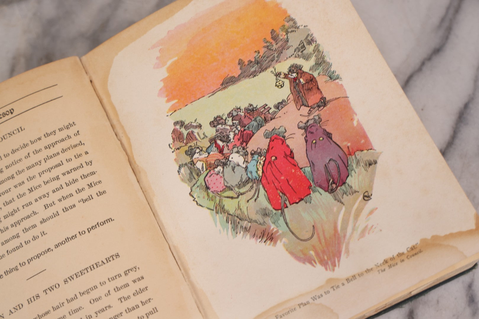 Lot 117 - "Aesop's Fables" Antique Book With Introduction By Elizabeth Luther Cary, Illustrated By J.M. Condé, Lithographed Cover, Published By The Platt & Peck Co., New York, Copyright 1913, Note Water Damage.