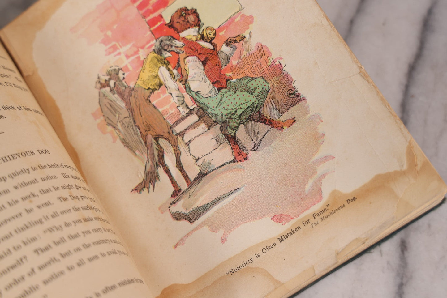 Lot 117 - "Aesop's Fables" Antique Book With Introduction By Elizabeth Luther Cary, Illustrated By J.M. Condé, Lithographed Cover, Published By The Platt & Peck Co., New York, Copyright 1913, Note Water Damage.