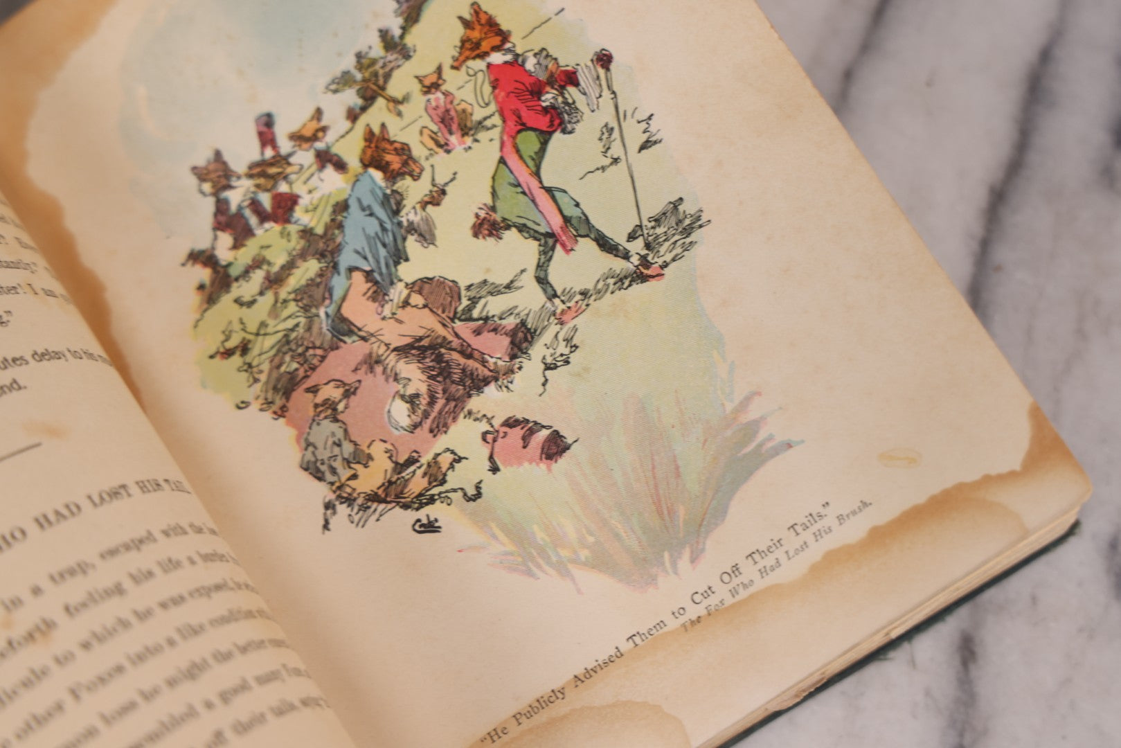 Lot 117 - "Aesop's Fables" Antique Book With Introduction By Elizabeth Luther Cary, Illustrated By J.M. Condé, Lithographed Cover, Published By The Platt & Peck Co., New York, Copyright 1913, Note Water Damage.