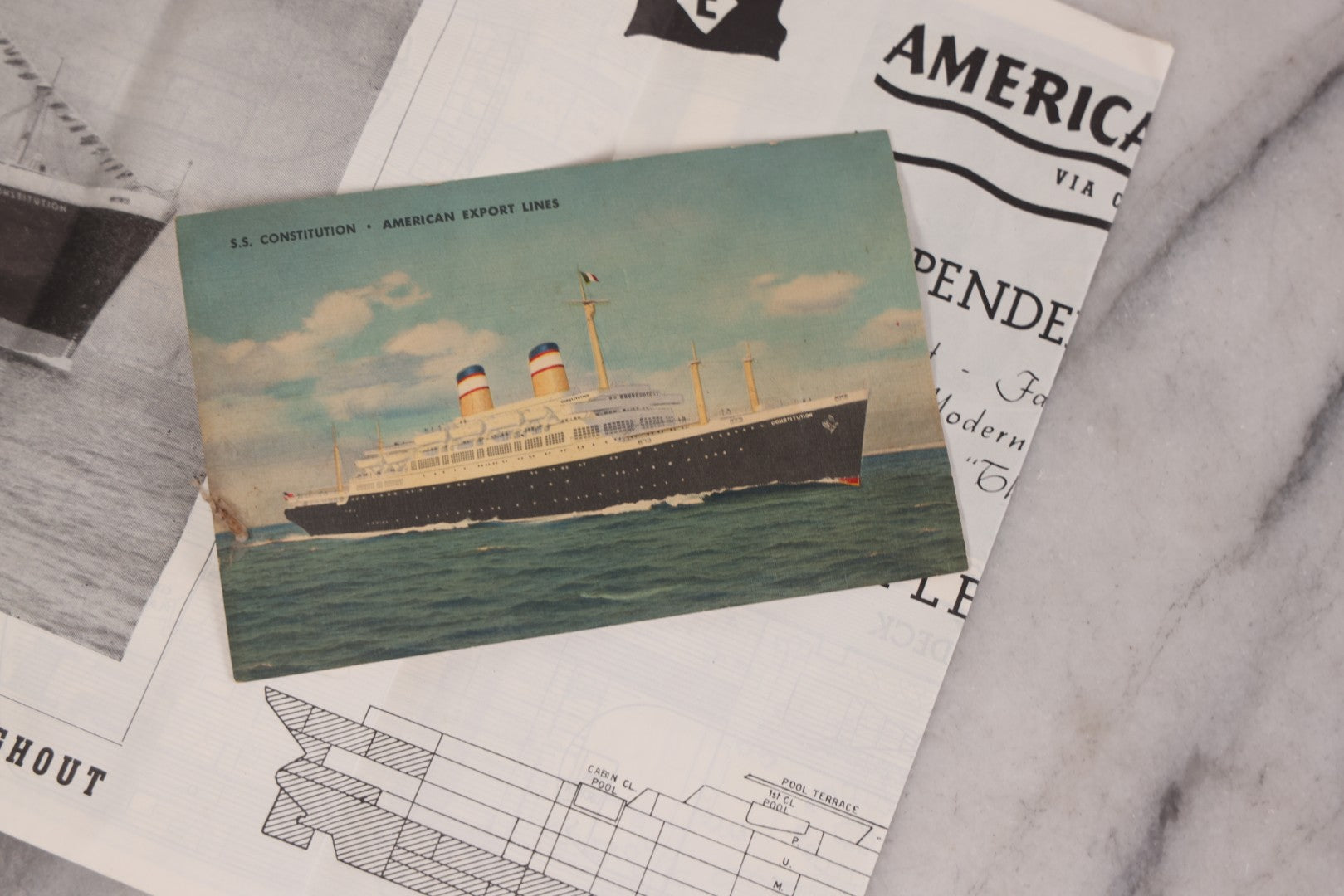 Lot 127 - Vintage Promotional Photograph Of The S.S. Constitution, American Export Lines Mediterranean Ocean Liner, In Plastic Frame, With Accompanying Postcard And Souvenir Deck Plans