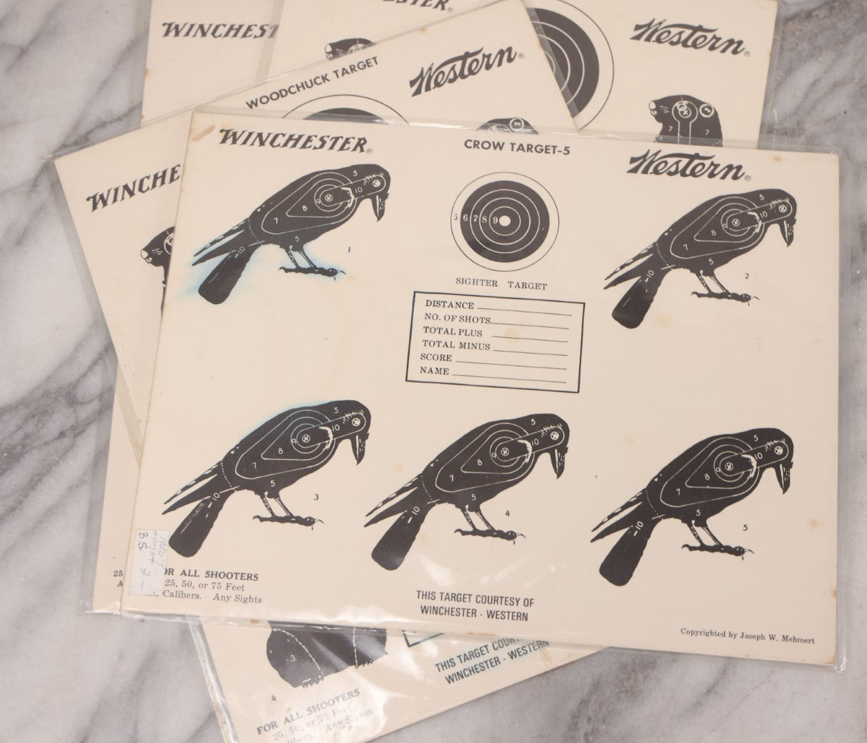 Lot 129 - Grouping Of Four Vintage Paper Winchester Western Rifle Shooting Targets Including Jack Rabbit, Crow, And Two Woodchuck Targets, Copyrighted By Joseph W. Mehmert