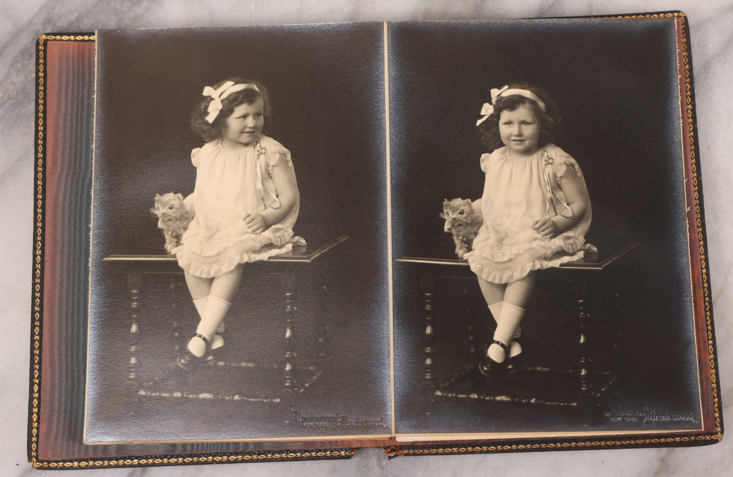Lot 138 - Antique Leather Photo Album Book With Twelve Studio Portraits Of A Young Girl, Including Images With Her Stuffed Cat, Portraits By Underwood & Underwood, New York, Washington, And Chicago