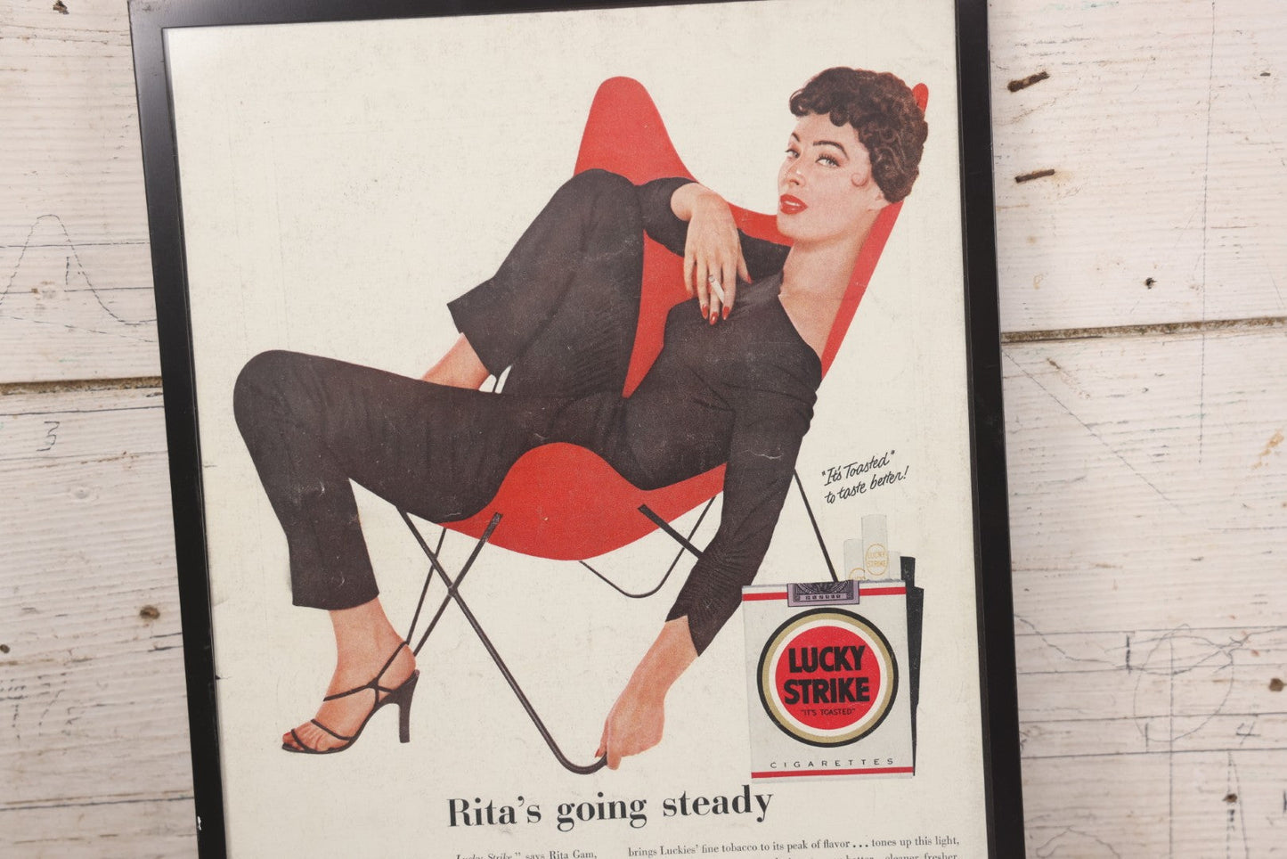 Lot 139 - Vintage Clipped Magazine Pin-Up Advertisement For Lucky Strike Cigarettes, "Rita's Going Steady," The American Tobacco Company, In Modern Frame