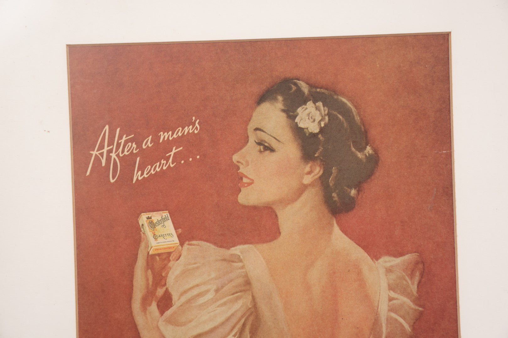 Lot 140 - Vintage Clipped Magazine Advertisement For Chesterfield Cigarettes, "After A Man's Heart...," In Modern Frame