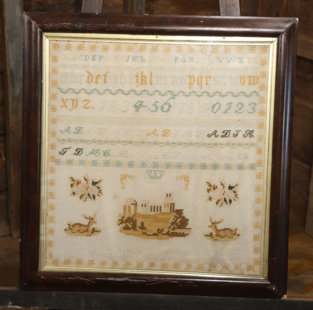 Antique European Schoolgirl Sampler With Alphabets, Numerals, Castle And Stag Motifs, Stitched By Maggie C. Dick, Age 13, Crosshill School, Circa Mid-19th Century, Framed, 26-3/8" X 27-1/4"