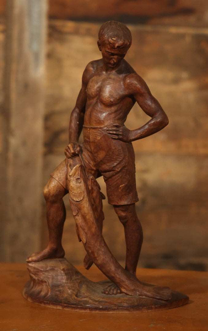 Vintage Folk Art Hand Carved Wood Sculpture Of Boy Fisherman Holding Large Catch, 18-5/8" H