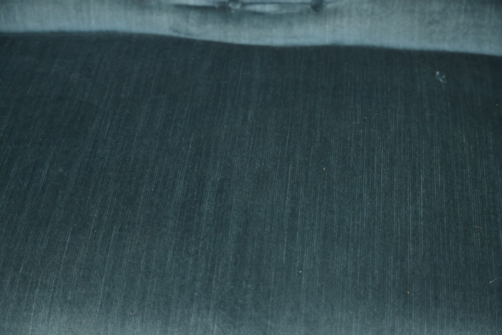 Antique Victorian Carved Walnut Settee With Tufted Blue Upholstery And Casters