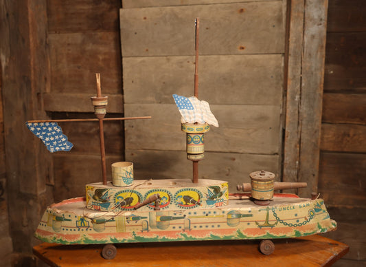 Early 20th Century “Uncle Sam” Paper Lithographed And Wood Pull Toy Battleship, 32" L
