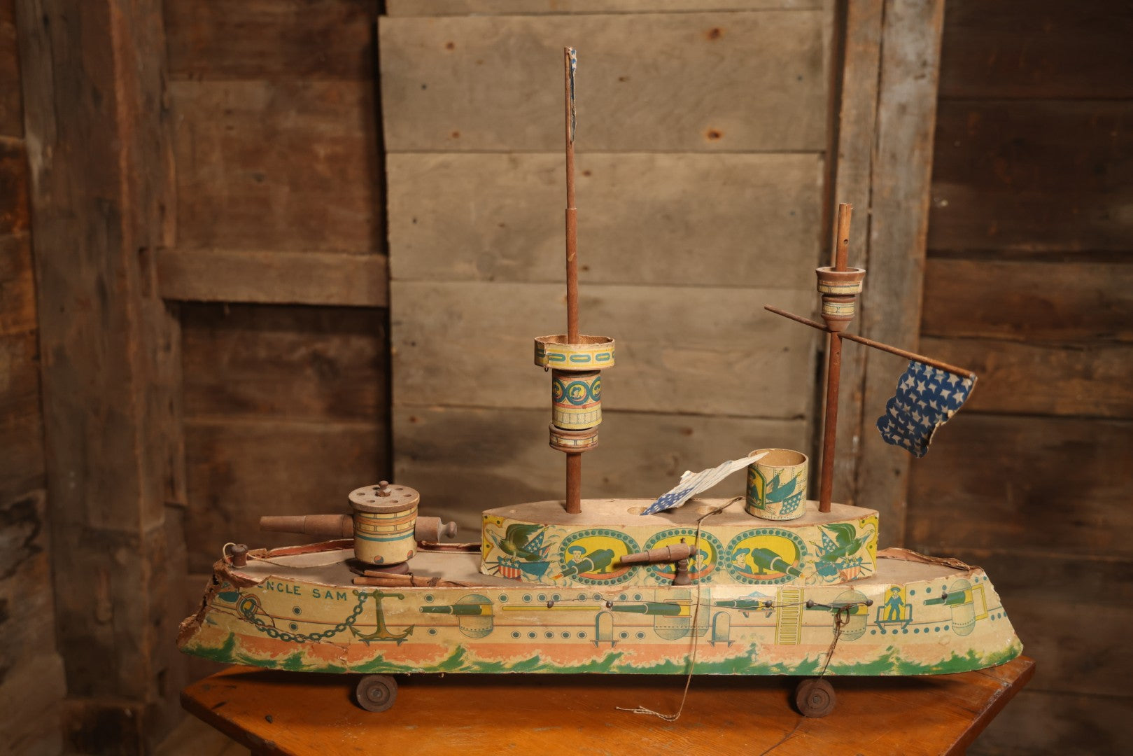 Early 20th Century “Uncle Sam” Paper Lithographed And Wood Pull Toy Battleship, 32" L