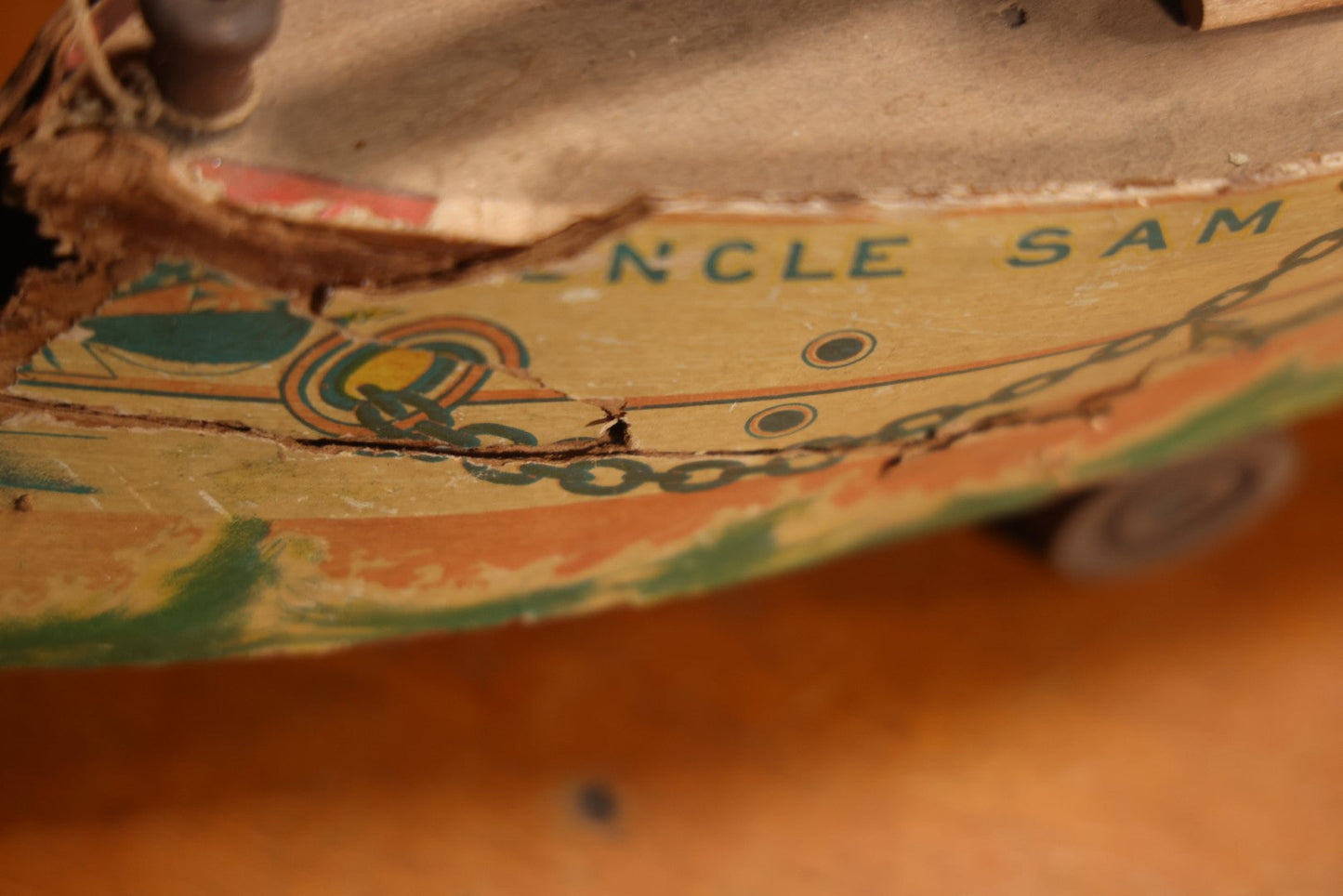 Early 20th Century “Uncle Sam” Paper Lithographed And Wood Pull Toy Battleship, 32" L