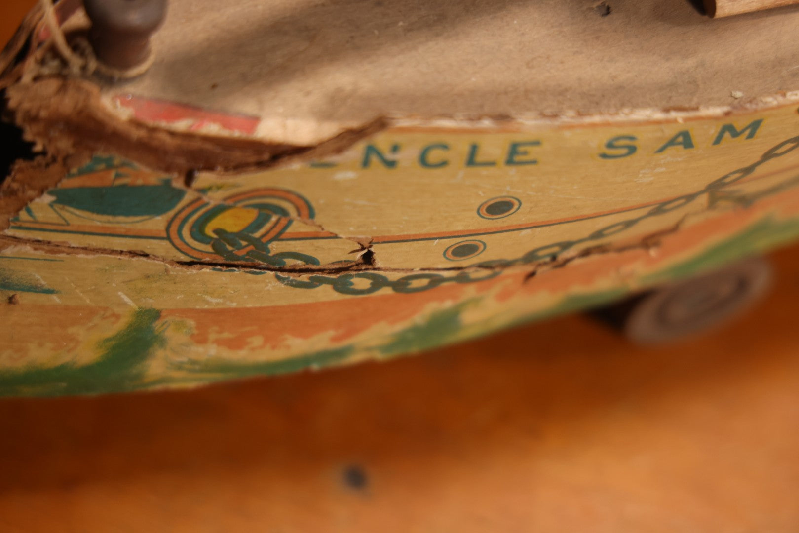 Early 20th Century “Uncle Sam” Paper Lithographed And Wood Pull Toy Battleship, 32" L