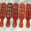 Lot 003 - Grouping Of Nine Vintage Folk Art Carnival Wheel Game Betting Paddles, Hand Painted Wood With Red Background And White Numbers, Circa 1930s 11-1/4" H Each