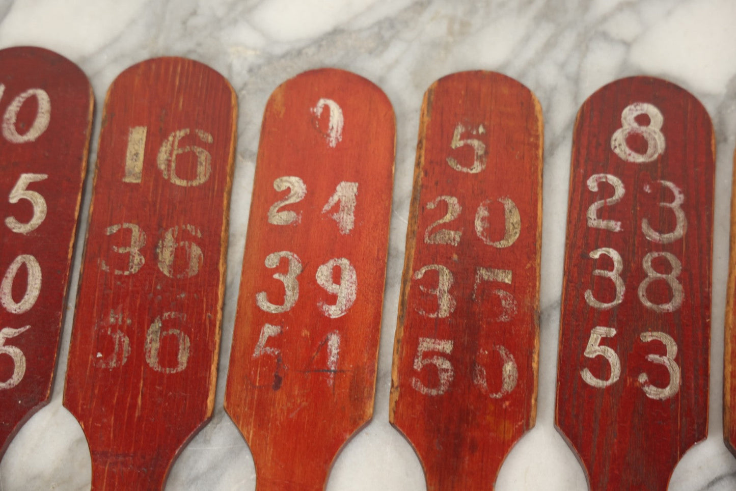Lot 003 - Grouping Of Nine Vintage Folk Art Carnival Wheel Game Betting Paddles, Hand Painted Wood With Red Background And White Numbers, Circa 1930s 11-1/4" H Each