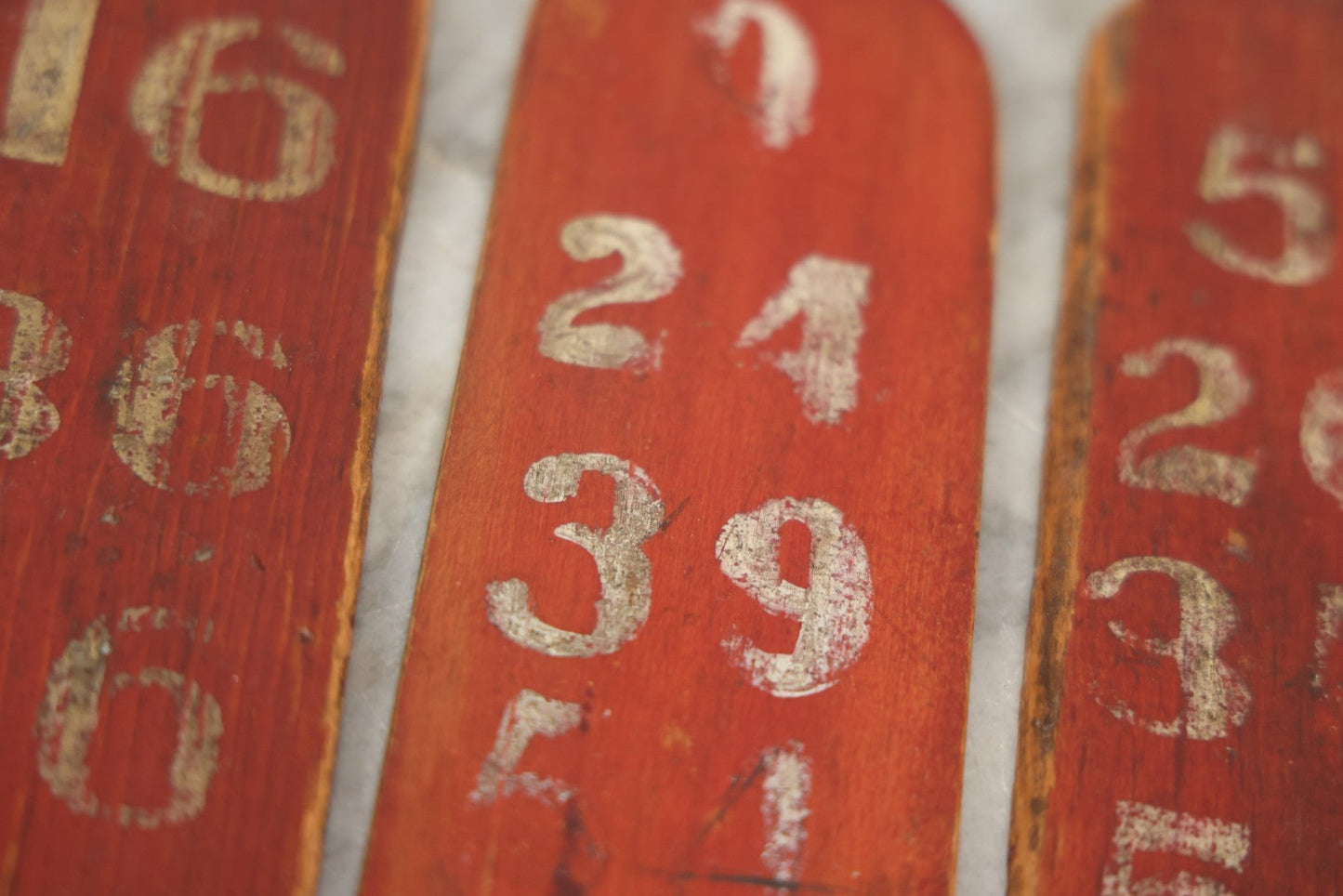 Lot 003 - Grouping Of Nine Vintage Folk Art Carnival Wheel Game Betting Paddles, Hand Painted Wood With Red Background And White Numbers, Circa 1930s 11-1/4" H Each