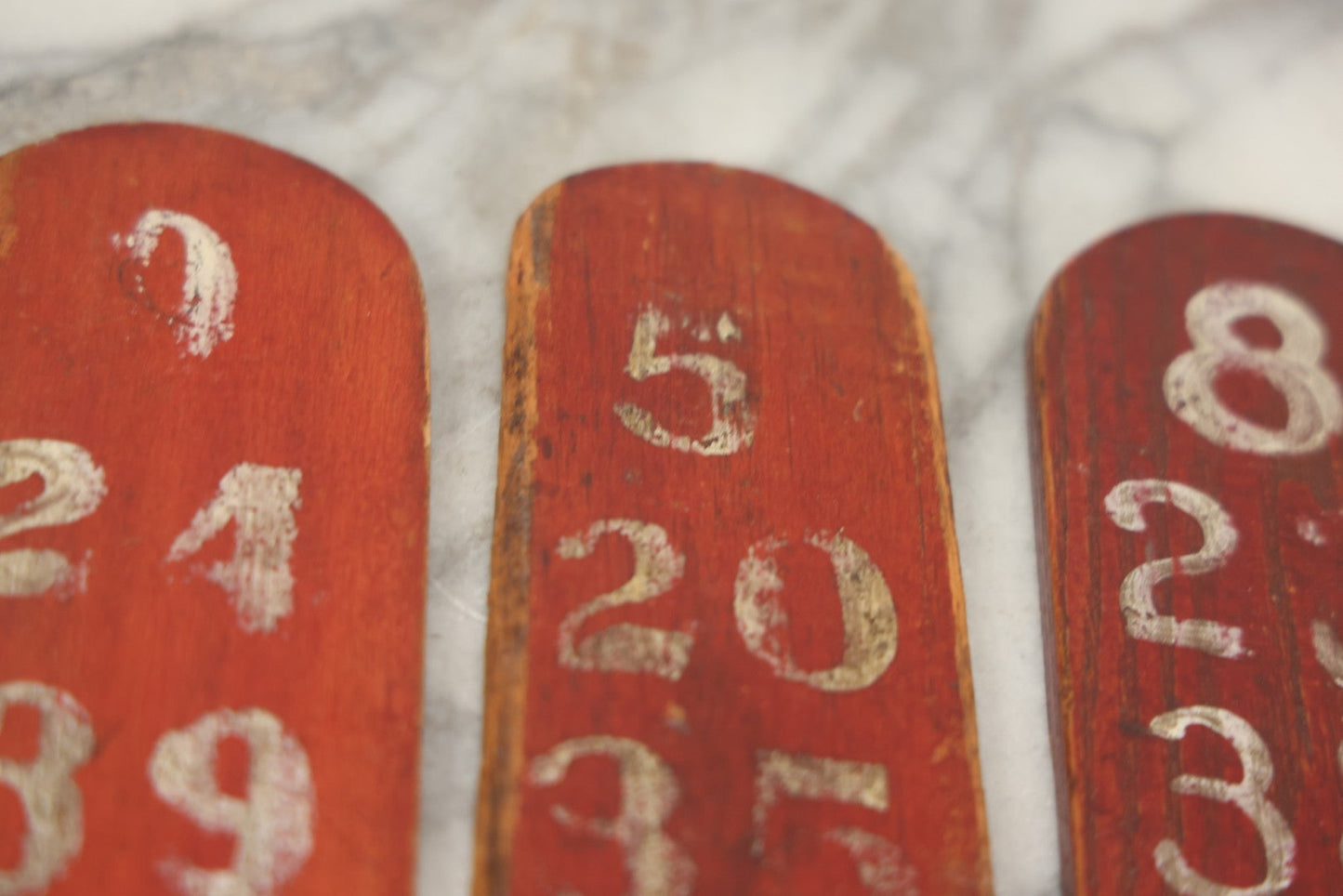 Lot 003 - Grouping Of Nine Vintage Folk Art Carnival Wheel Game Betting Paddles, Hand Painted Wood With Red Background And White Numbers, Circa 1930s 11-1/4" H Each