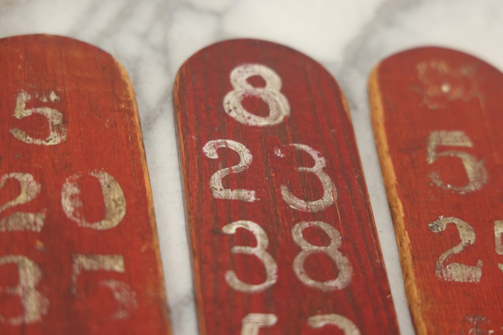 Lot 003 - Grouping Of Nine Vintage Folk Art Carnival Wheel Game Betting Paddles, Hand Painted Wood With Red Background And White Numbers, Circa 1930s 11-1/4" H Each
