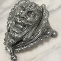 Lot 007 - Antique Pewter Figural Inkwell With Jester Head Motif And Glass Insert, Note Damaged Foot