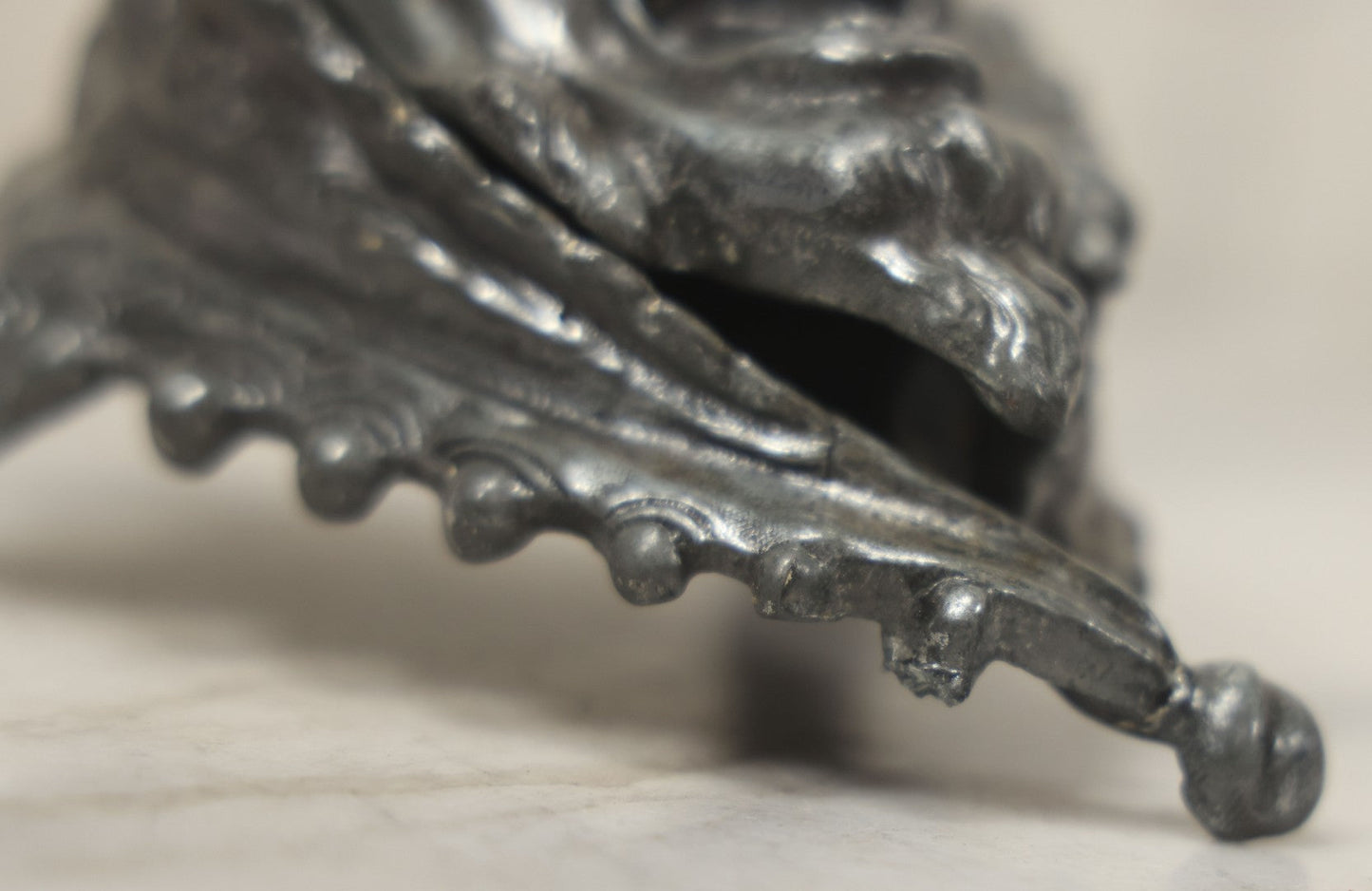 Lot 007 - Antique Pewter Figural Inkwell With Jester Head Motif And Glass Insert, Note Damaged Foot