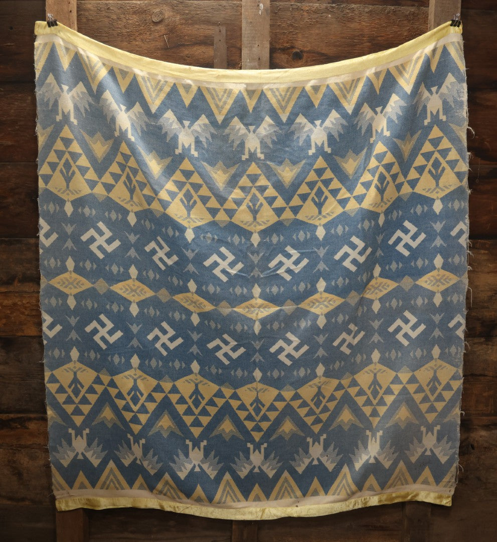 Lot 011 - Vintage Navajo-Style Textile Camp Blanket With Whirling Logs And Thunderbird Motifs, Blue And Yellow, Circa 1920s 60" x 70"