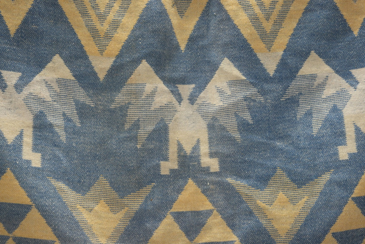 Lot 011 - Vintage Navajo-Style Textile Camp Blanket With Whirling Logs And Thunderbird Motifs, Blue And Yellow, Circa 1920s 60" x 70"