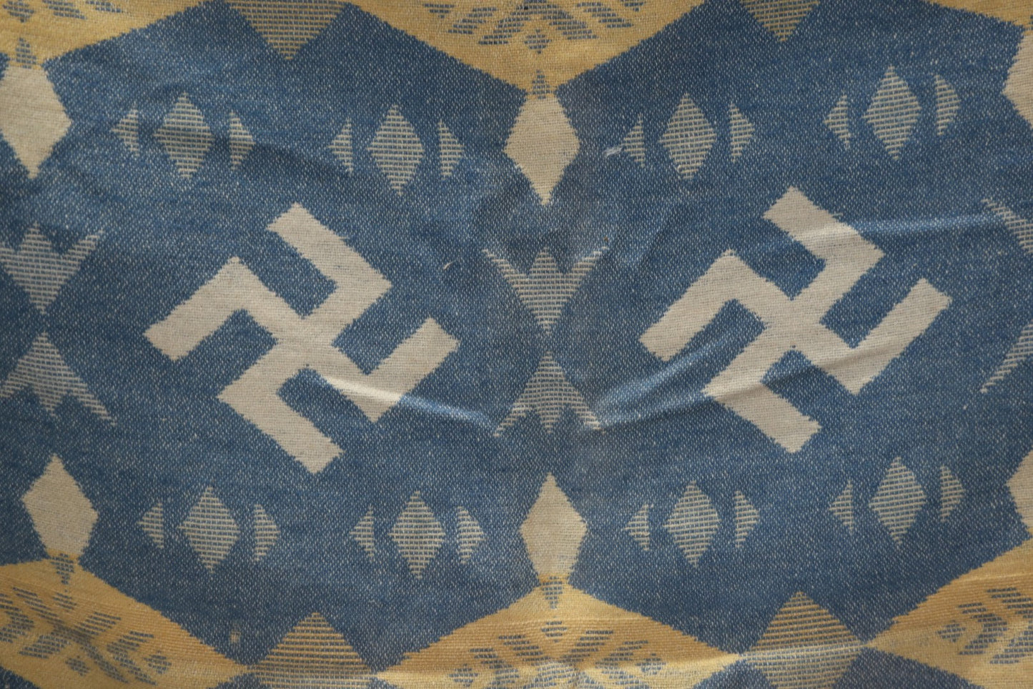 Lot 011 - Vintage Navajo-Style Textile Camp Blanket With Whirling Logs And Thunderbird Motifs, Blue And Yellow, Circa 1920s 60" x 70"