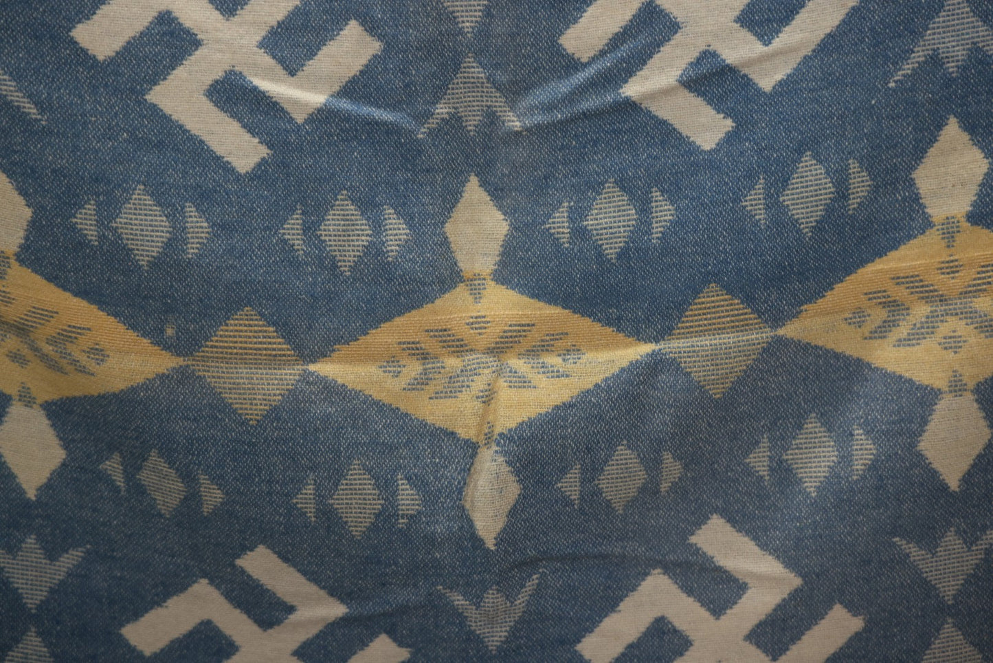 Lot 011 - Vintage Navajo-Style Textile Camp Blanket With Whirling Logs And Thunderbird Motifs, Blue And Yellow, Circa 1920s 60" x 70"